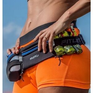 FITLETIC running belt in black with pink trim.